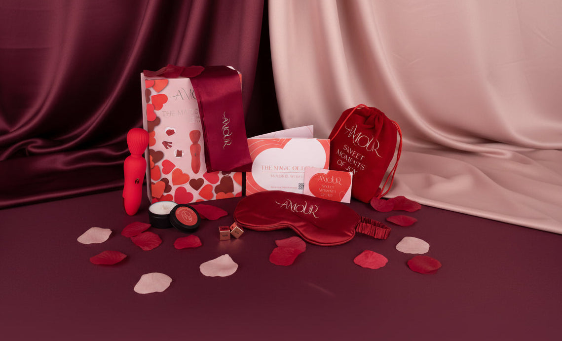 collection of pleasure products on a burgundy background